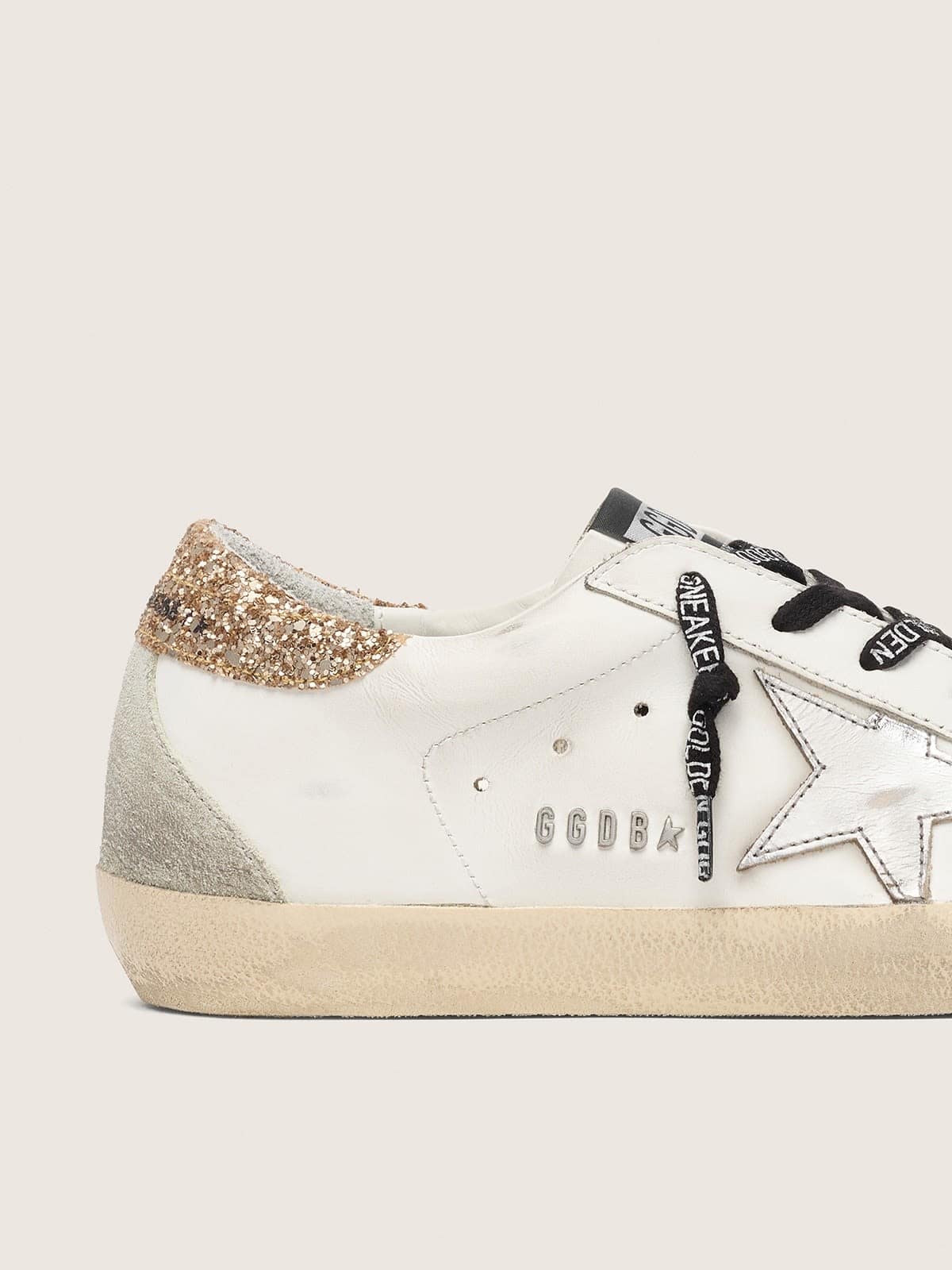 Super-Star en cuir blanc avec contrefort pailleté