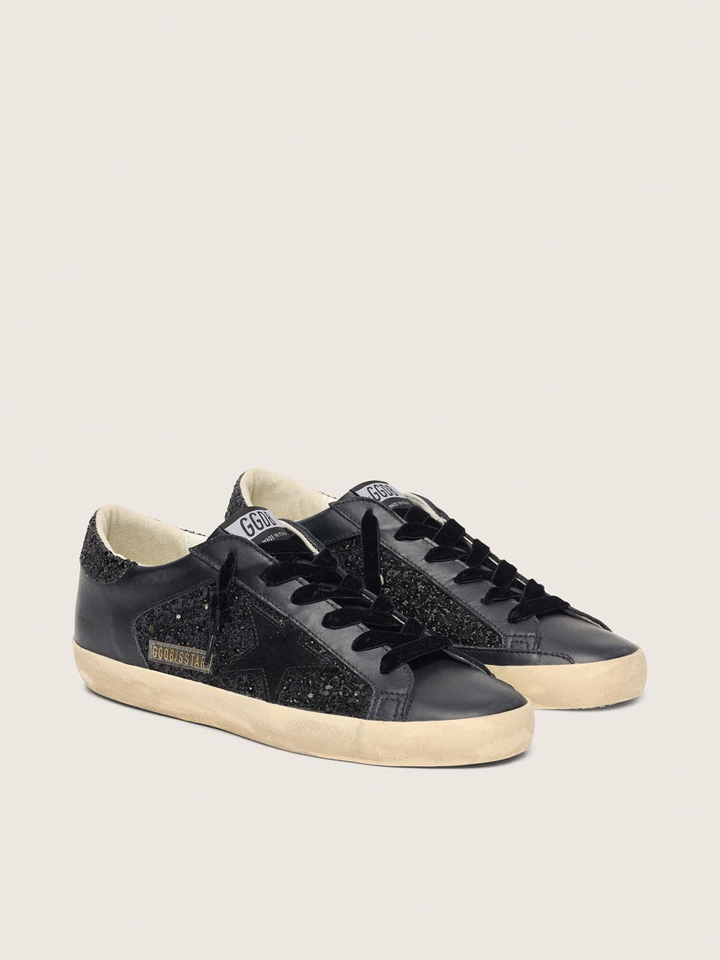 Super-Star pour femme à paillettes noires avec étoile en daim noir et empiècements en cuir