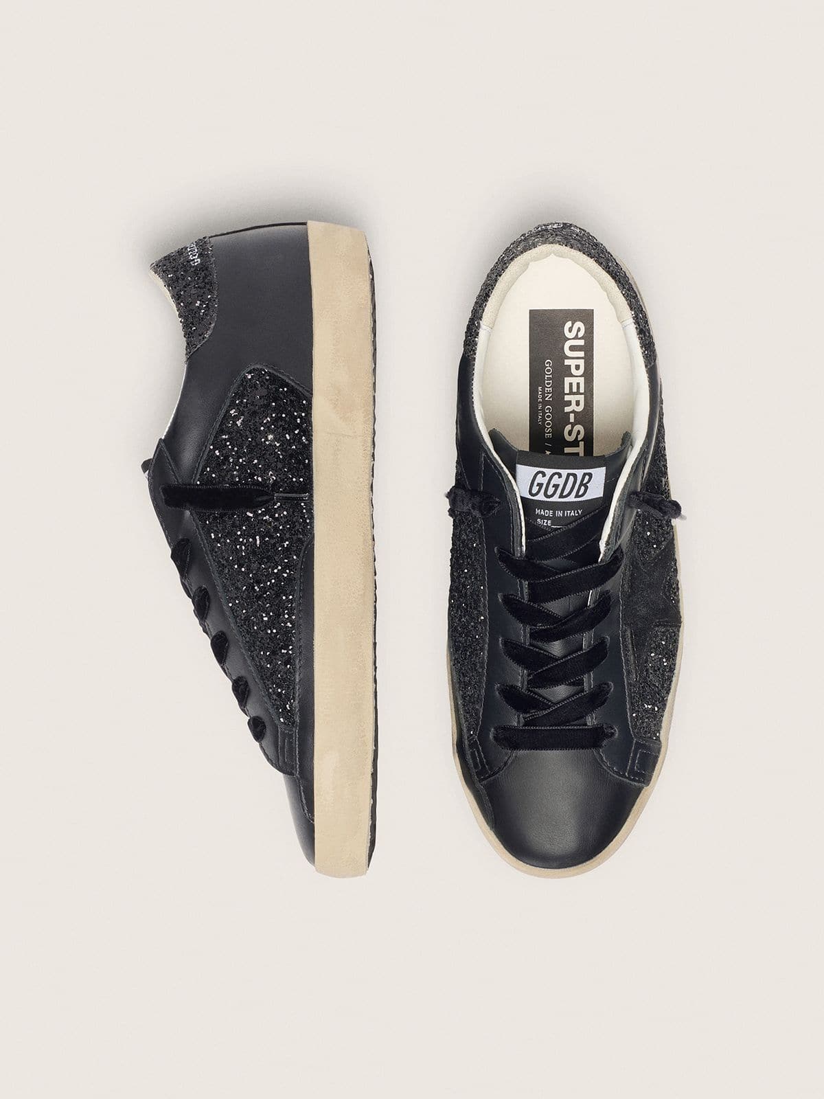 Super-Star pour femme à paillettes noires avec étoile en daim noir et empiècements en cuir